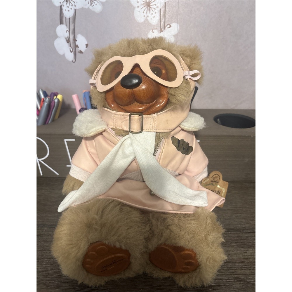 A Robert Raikes Original Bears Amelia Wood Face Feet Aviator Flying High Bear